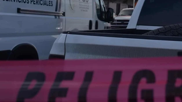 Hallan cadaver en terreno baldio